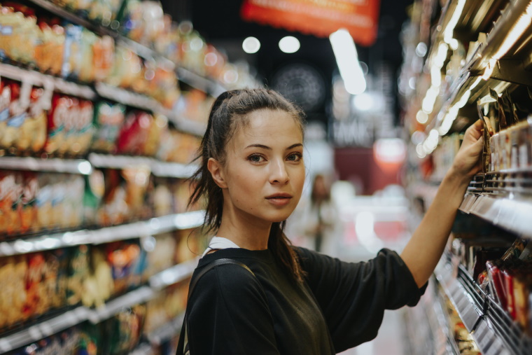 Disability help at supermarket- girl shopping